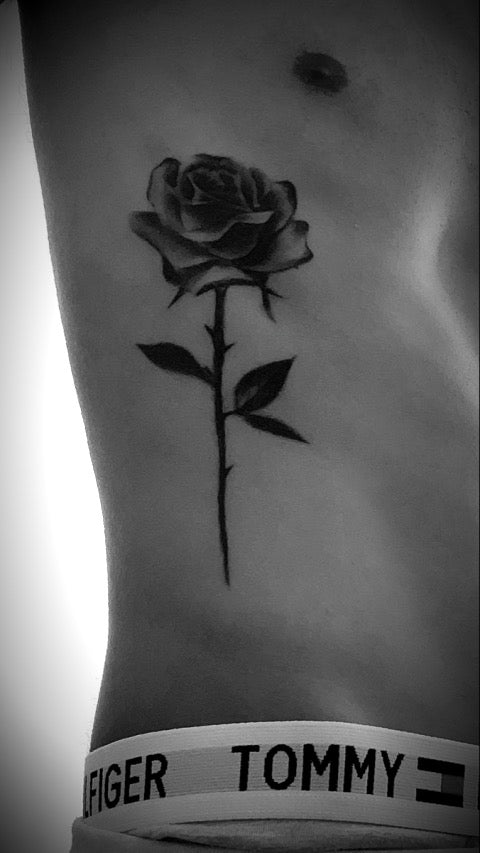 Rose Rib Tattoo