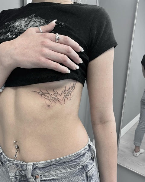 Simple Underboob Tattoo