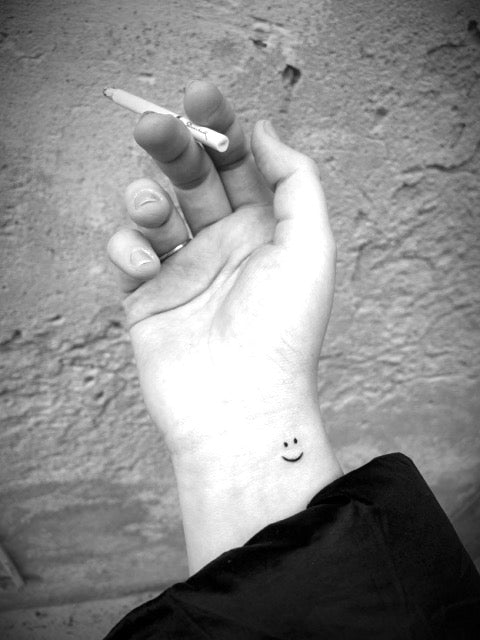 Smiley Face Tattoo