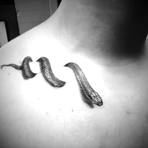 Snake Collar Bone Tattoos