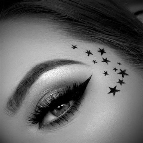 Star Face Tattoo