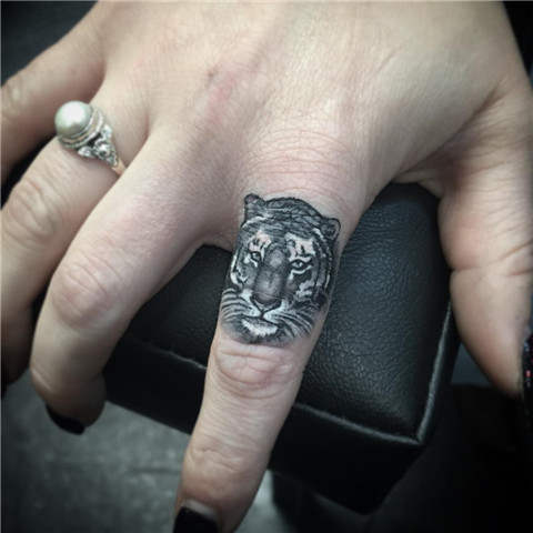 Tiger Finger Tattoo