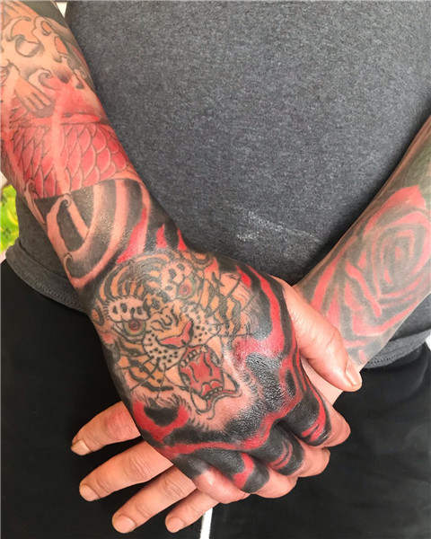 Tiger Hand Tattoo