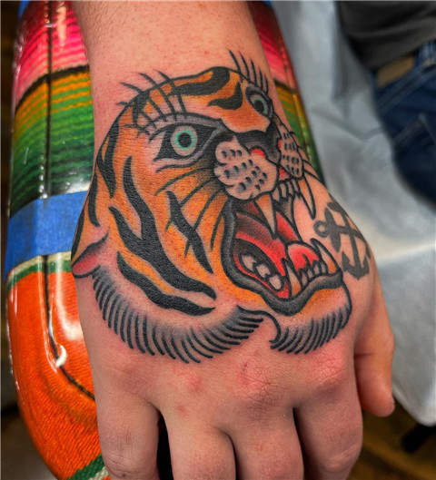 Tiger Portrait Hand Tattoo by Kris Kezart  Remington Tattoo Parlor