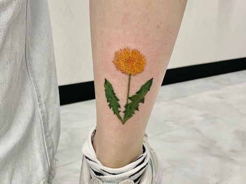 Yellow dandelion Tattoo