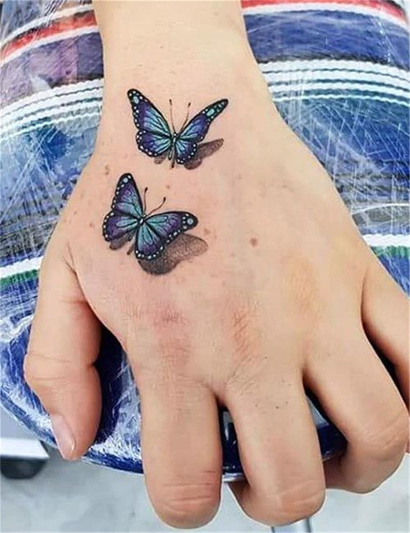 20 Simple and Beautiful Butterfly Tattoos Mainly for Your Fingers Backs  and Arms  Bellacocosum  Hand tattoos for women Butterfly tattoo designs Butterfly  tattoos for women