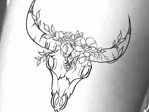 bull skull with flowers tattoo