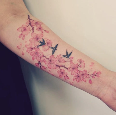 cherry blossom tattoo on forearm