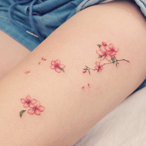 cherry blossom thigh tattoo