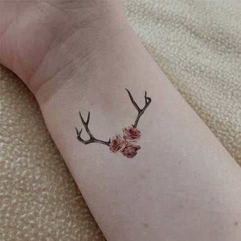 Majestic stag with exagerrated antlers tattoo idea | TattoosAI