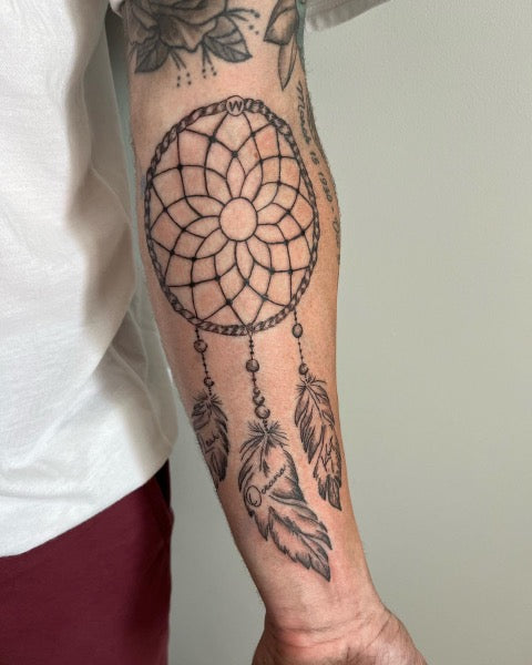 dream catcher sleeve tattoo