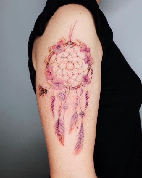 dream catcher tattoo on arm