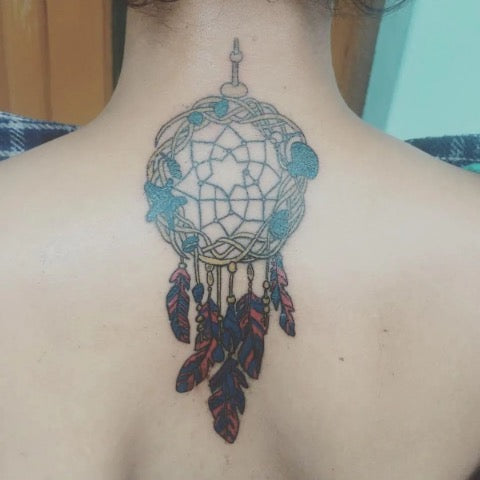 dream catcher tattoo on back