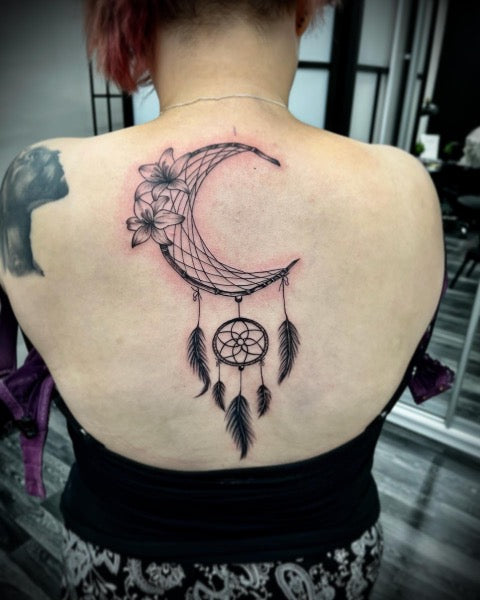 dream catcher tattoo on back