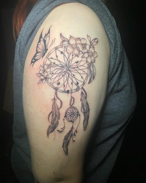 dream catcher tattoo on shoulder