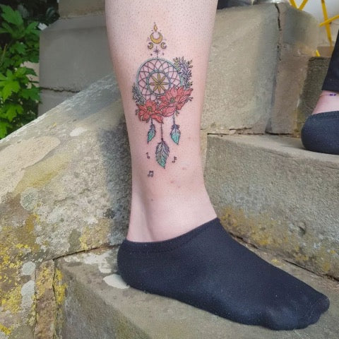 dream catcher tattoo with flowers