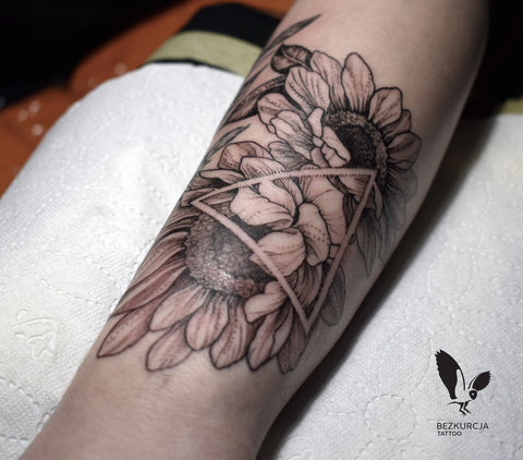 geometric sunflower tattoo