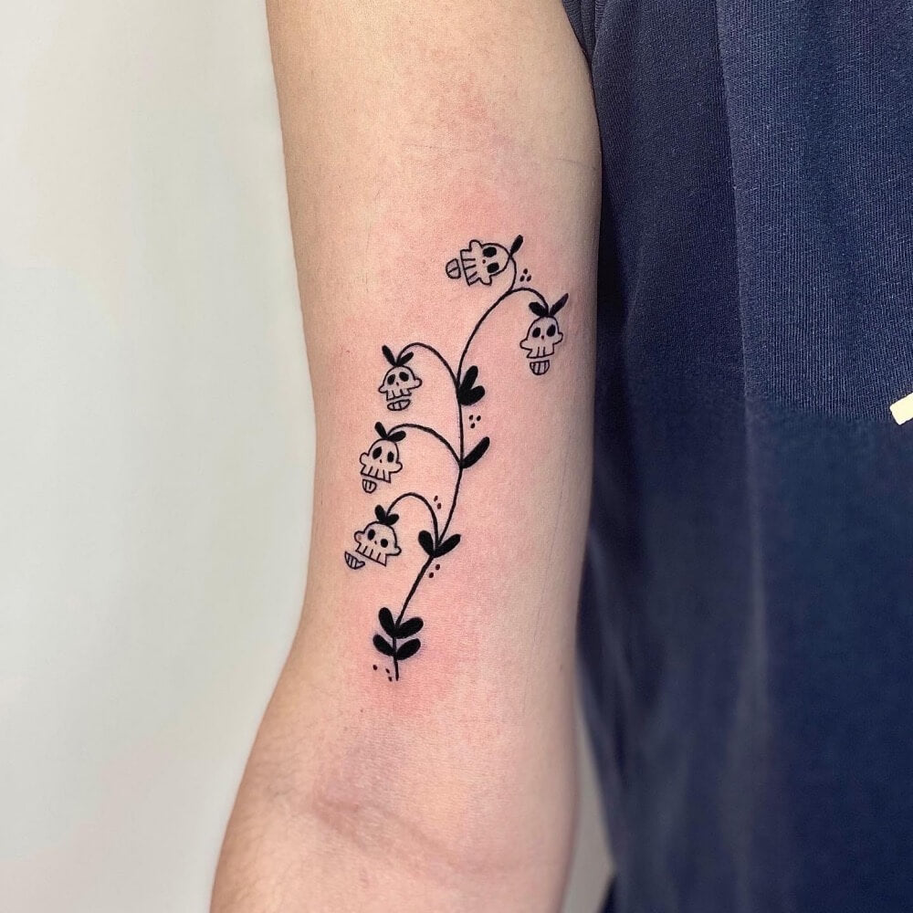 Lily of the Valley Skull Tattoo