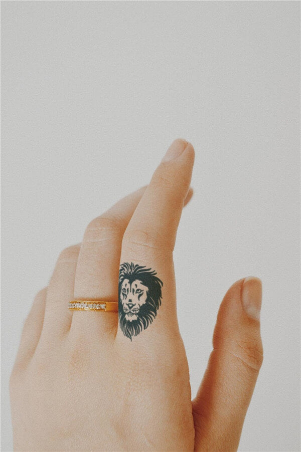 Lion Finger Tattoo