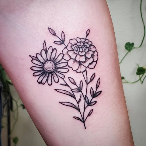 marigold and daisy tattoo