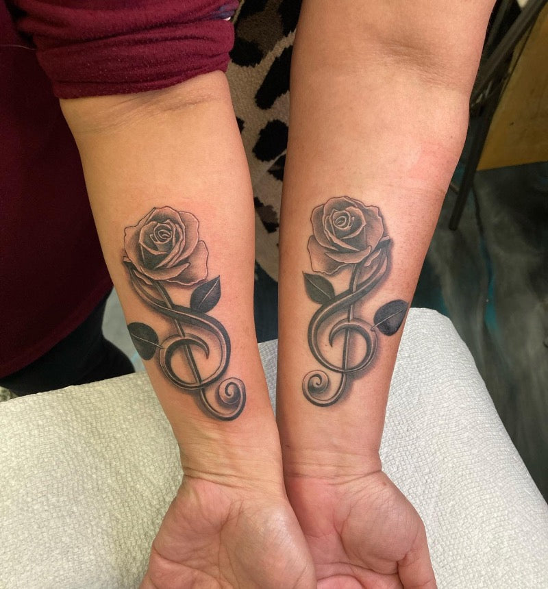 music note flower tattoo