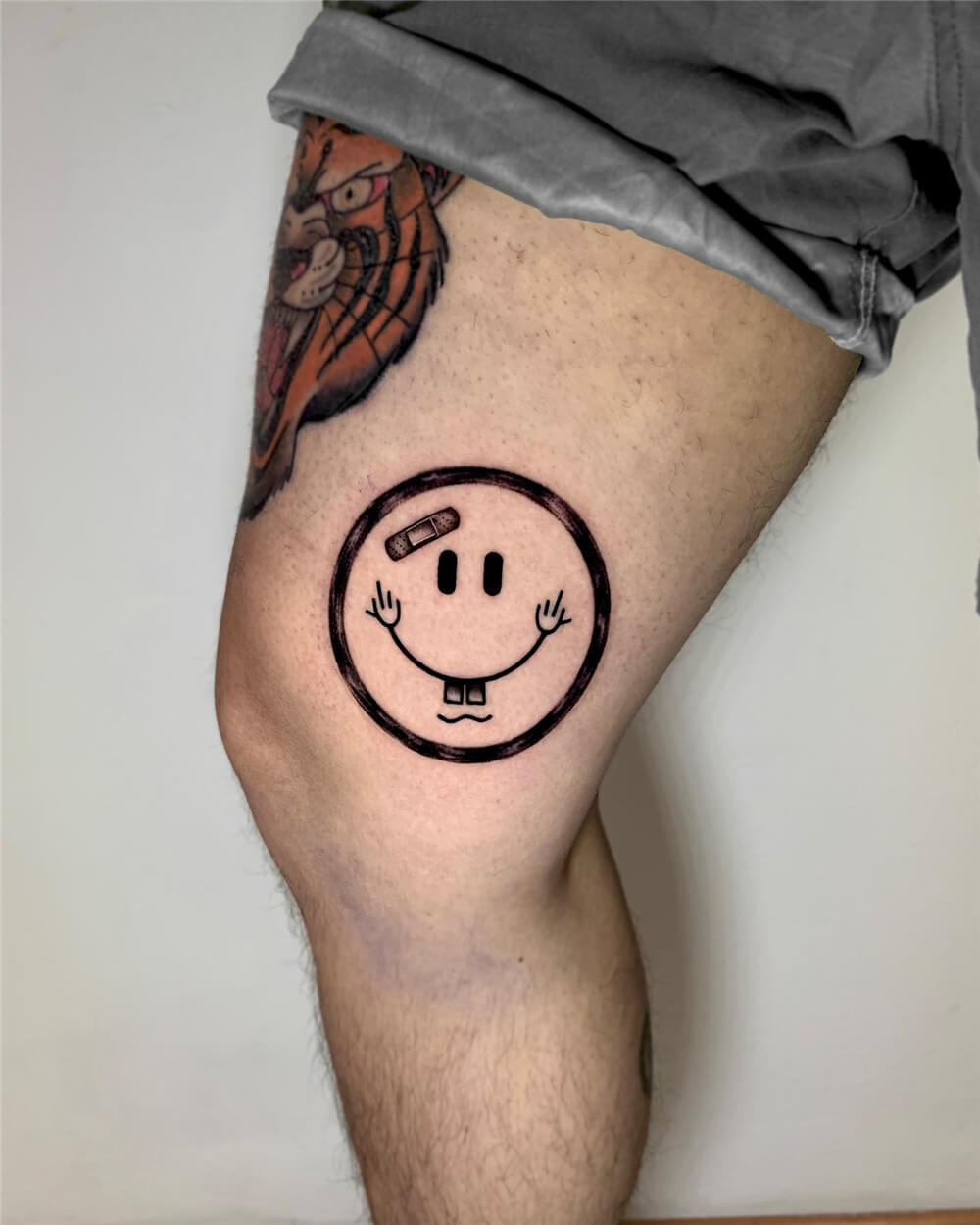 smiley tattoo