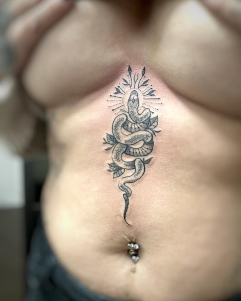 snake underboob tattoo