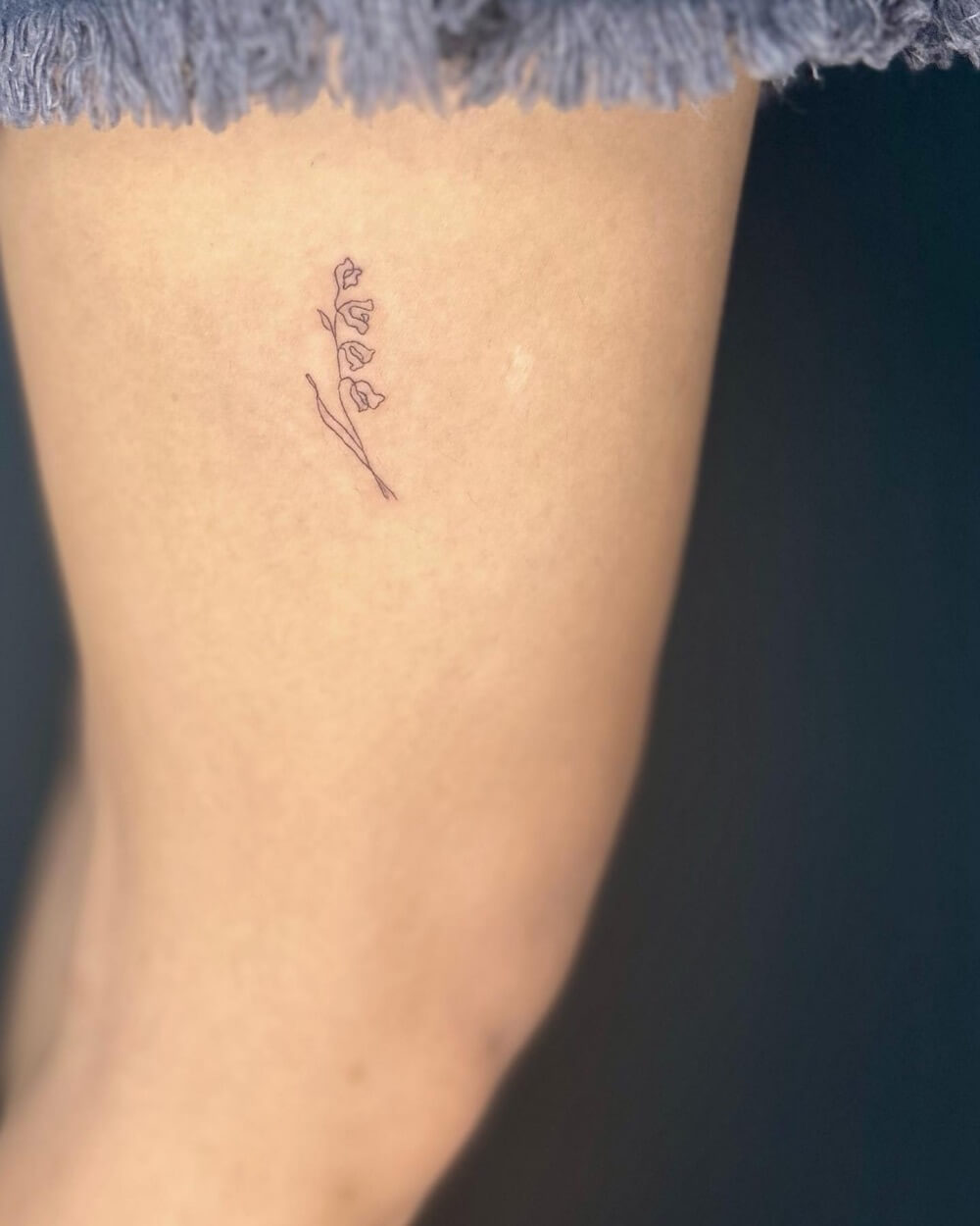 Tiny Lily of the Valley Tattoo
