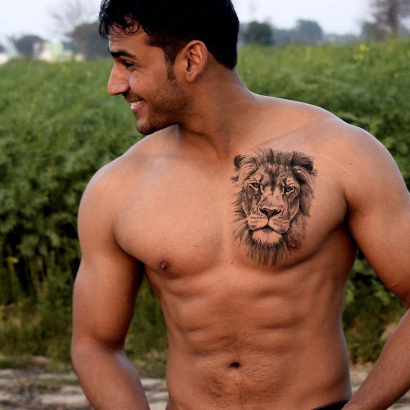 Tribal Lion Chest Tattoo