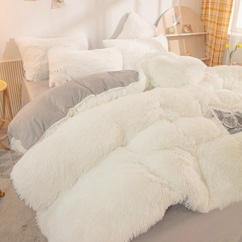 white fluffy bed set