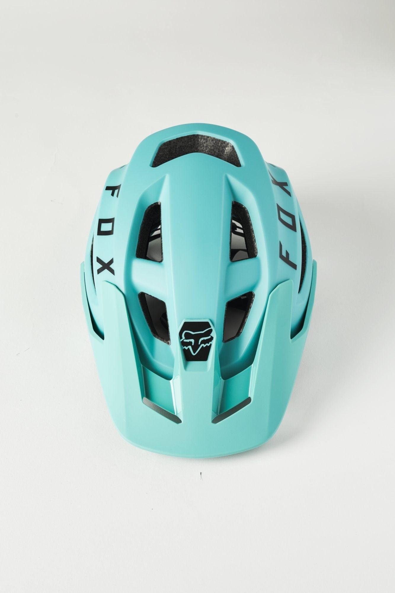 teal mountain bike helmet