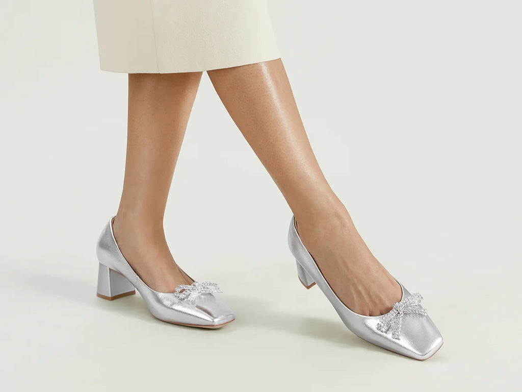 Silver heels, versatile and shimmering, are the trendy choice for adding sparkle to both everyday and fancy outfits in 2024.