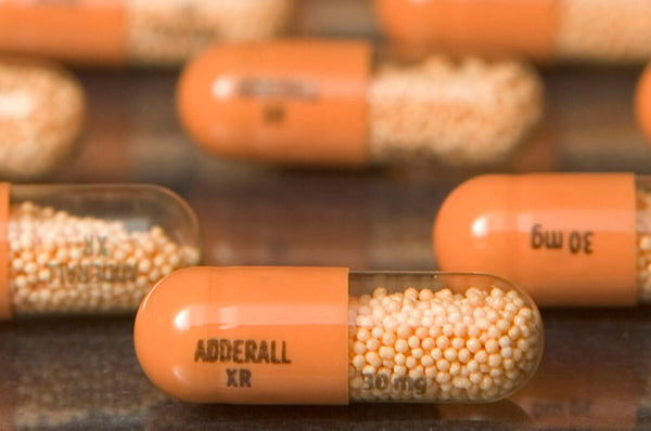 Adderall Pills On a Table