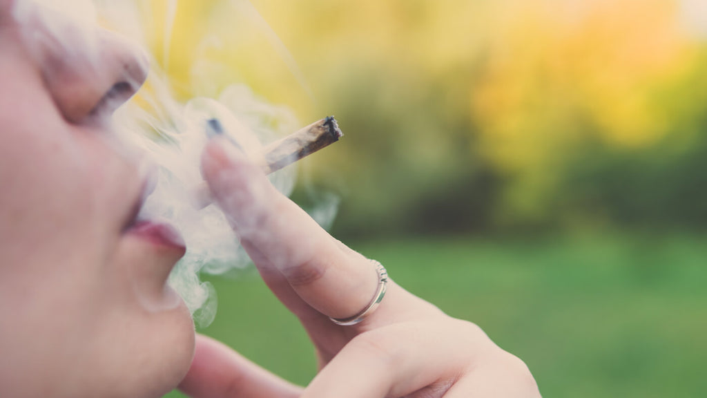 Girl Smoking Medical Marijuana Joint Outdoors