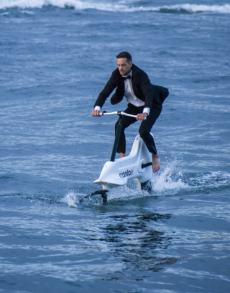 Luke Bakhuizen riding the Manta5 across the water to the James Bond movie premier of No Time to Die