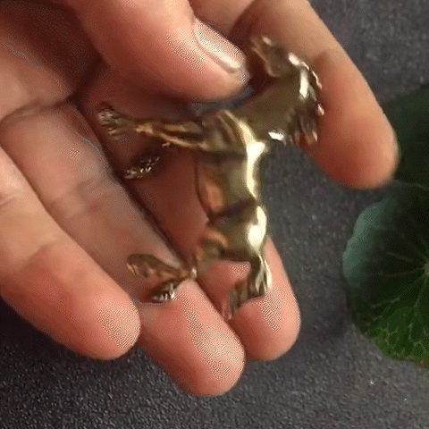 Small brass horse figurine