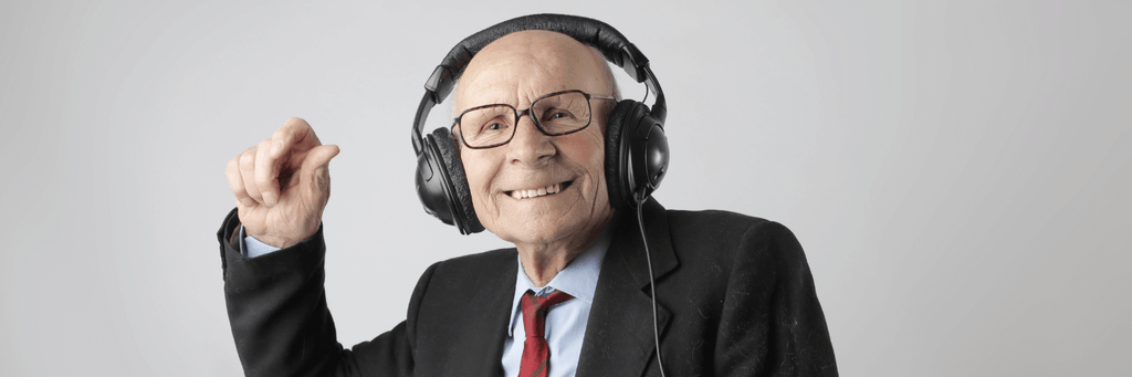 elderly man wearing headphones