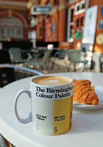 The Birmingham Colour Palette mug at a coffee shop in Birmingham city centre