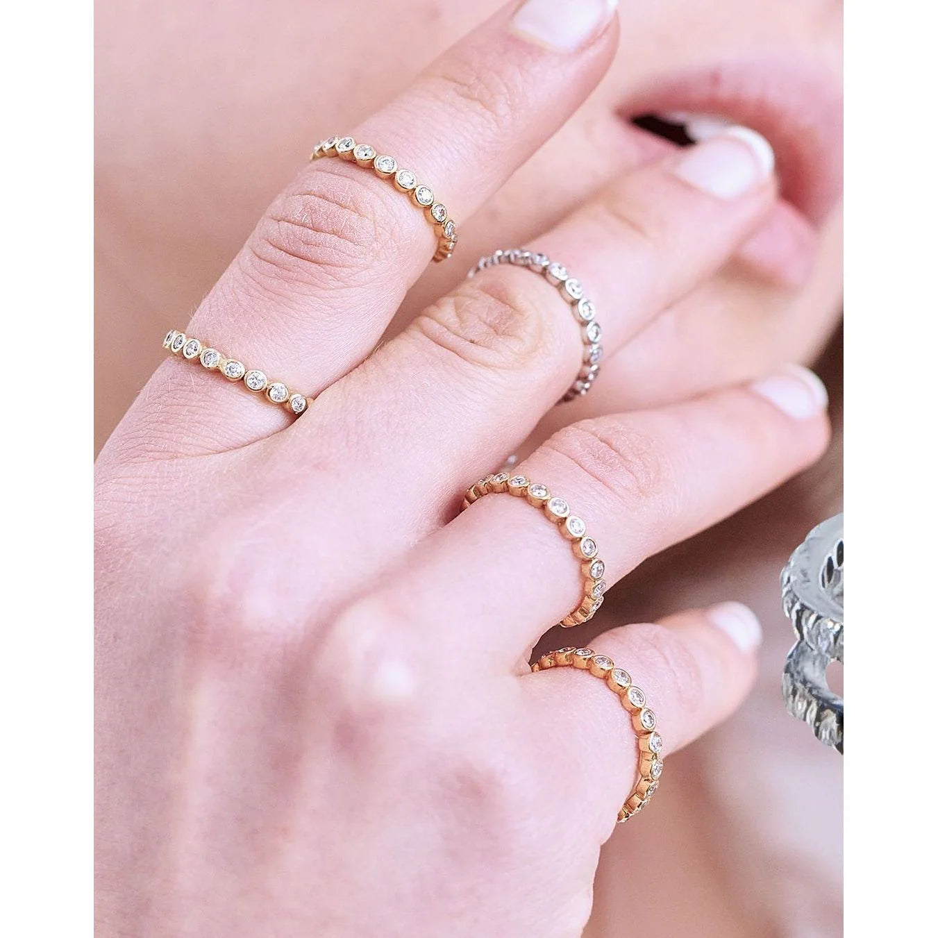A person styling churumbela rings by OnPost