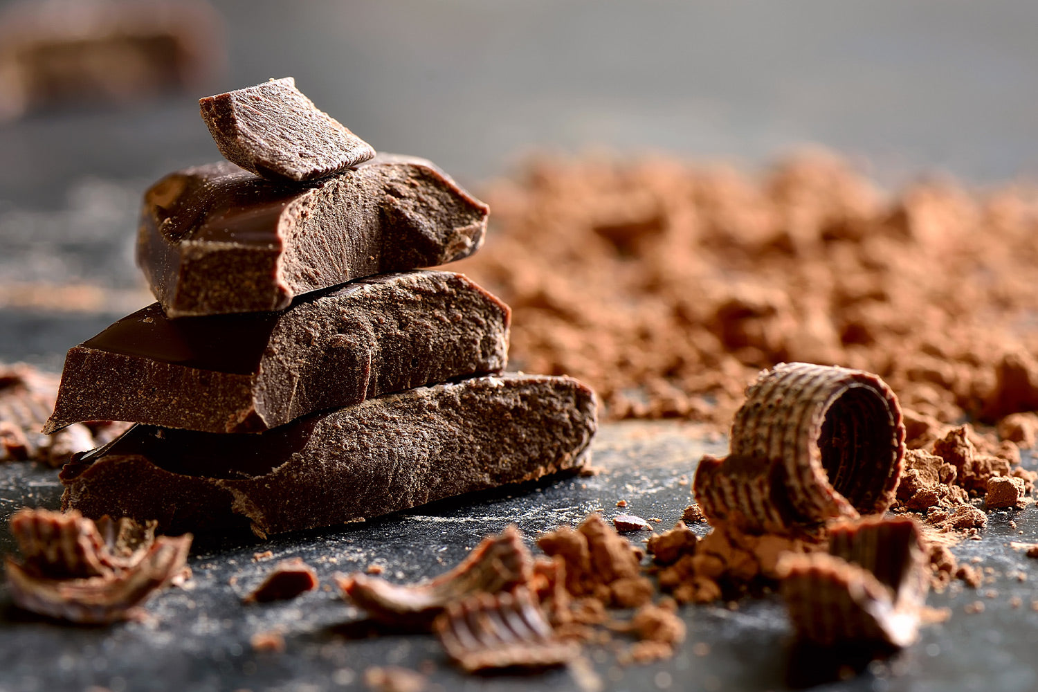 chocolate chunks sitting on a black surface