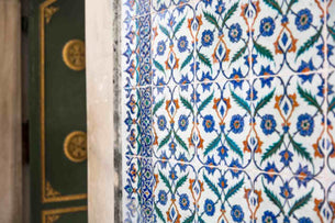 Antique tile design with a floral print