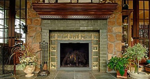 Old handmade tiles fireplace