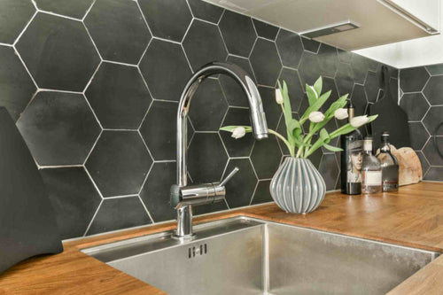 Luxury kitchen hexagonal tile with a tile backsplash in background