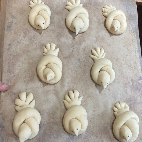 challah dough formed into doves