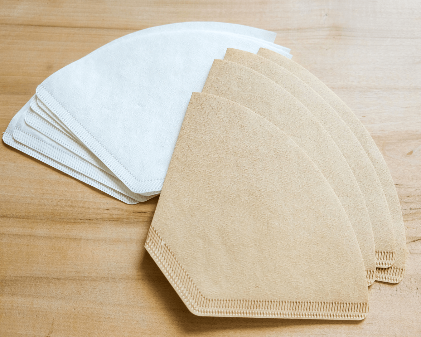A close comparison of bleached, cone-shaped paper coffee filters versus unbleached coffee filters