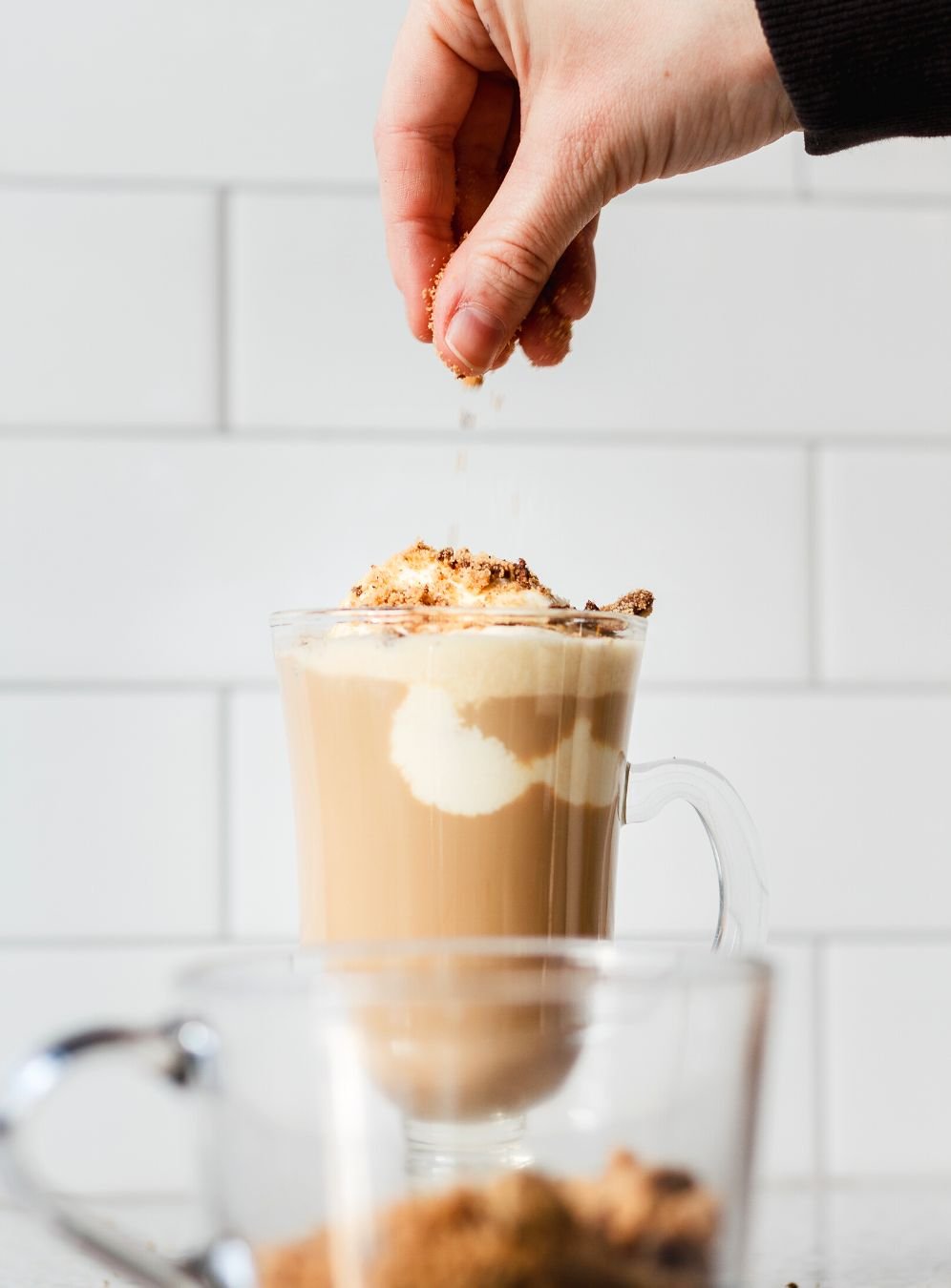 Adding cookie crumbs to the alcoholic float drink