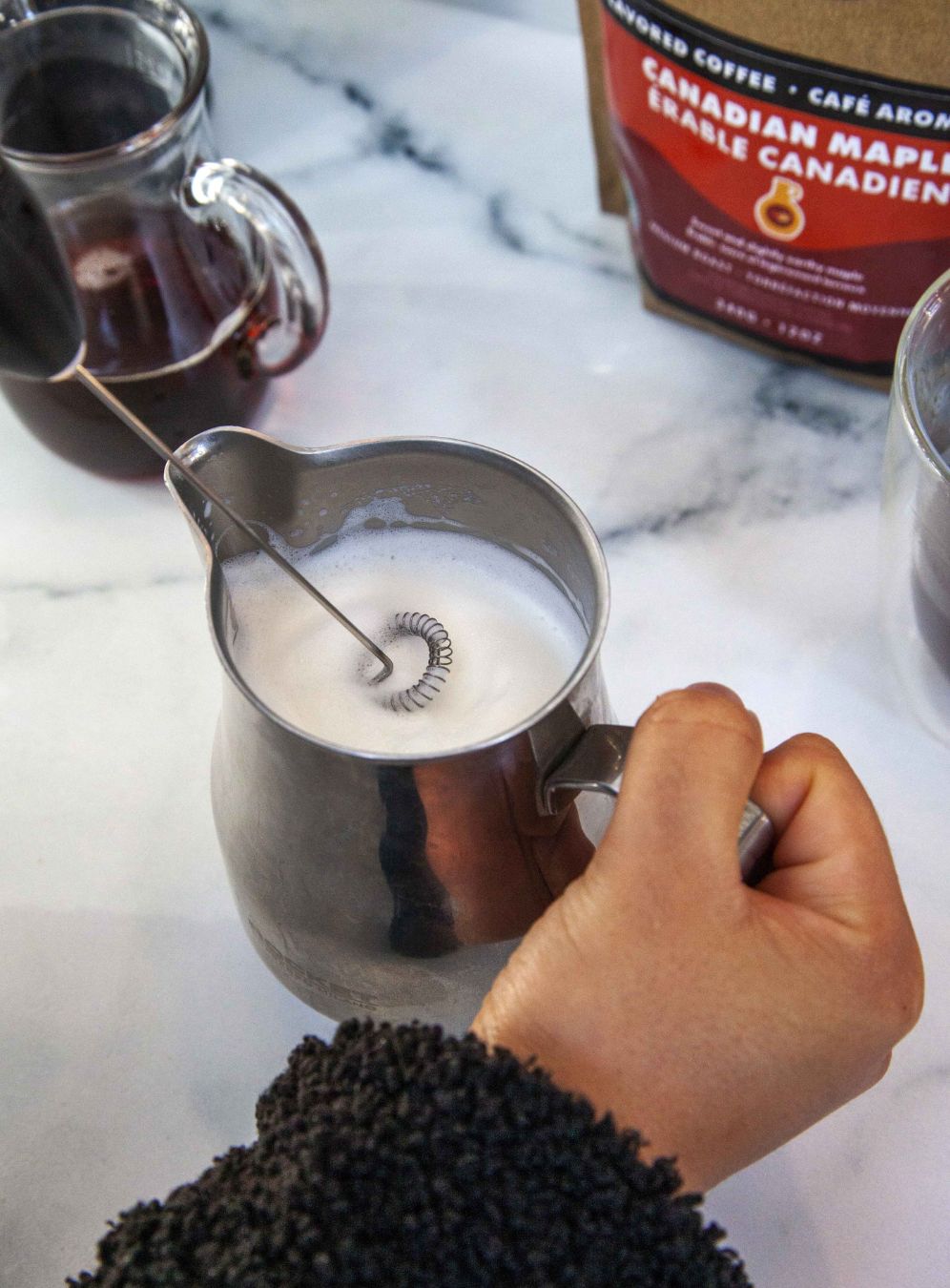 Foaming milk for the Canadian Maple Cafe con Leche recipe