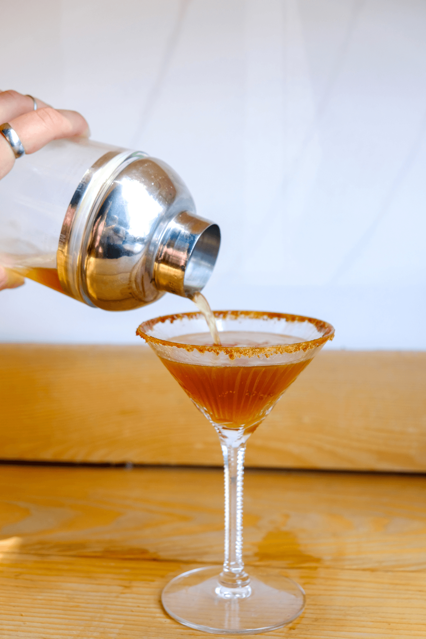 After mixing spiced rum, Zavida's Piña Colada Coffee, lime juice and ginger beer, pour into a martini glass.
