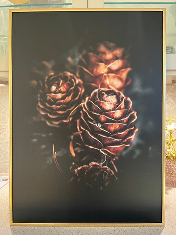 Pinecone love innrammet i gullramme