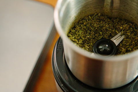 Kaug LidAdapt to make cannabis butter.  Grind decarboxylated cannabis flower in coffee grinder. Ground cannabis..